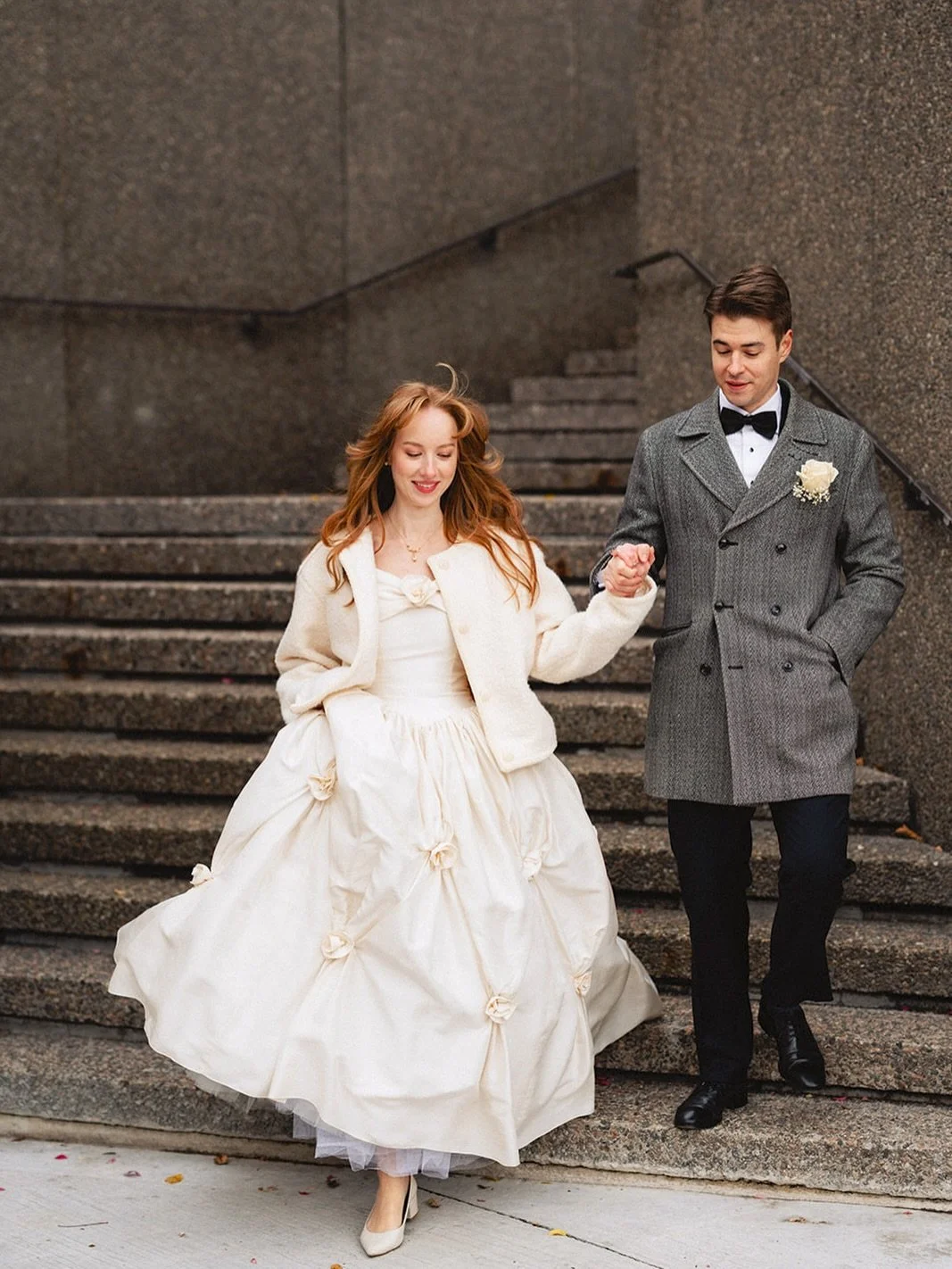 Bride Joanna in her 1950s duchess satin gown at the Windsor Arms